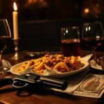 Mafia inspired Italian dinner table with ziti lamb and tarot card